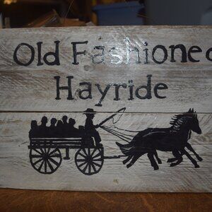 Old Fashioned Hayrides wooden hanging sign